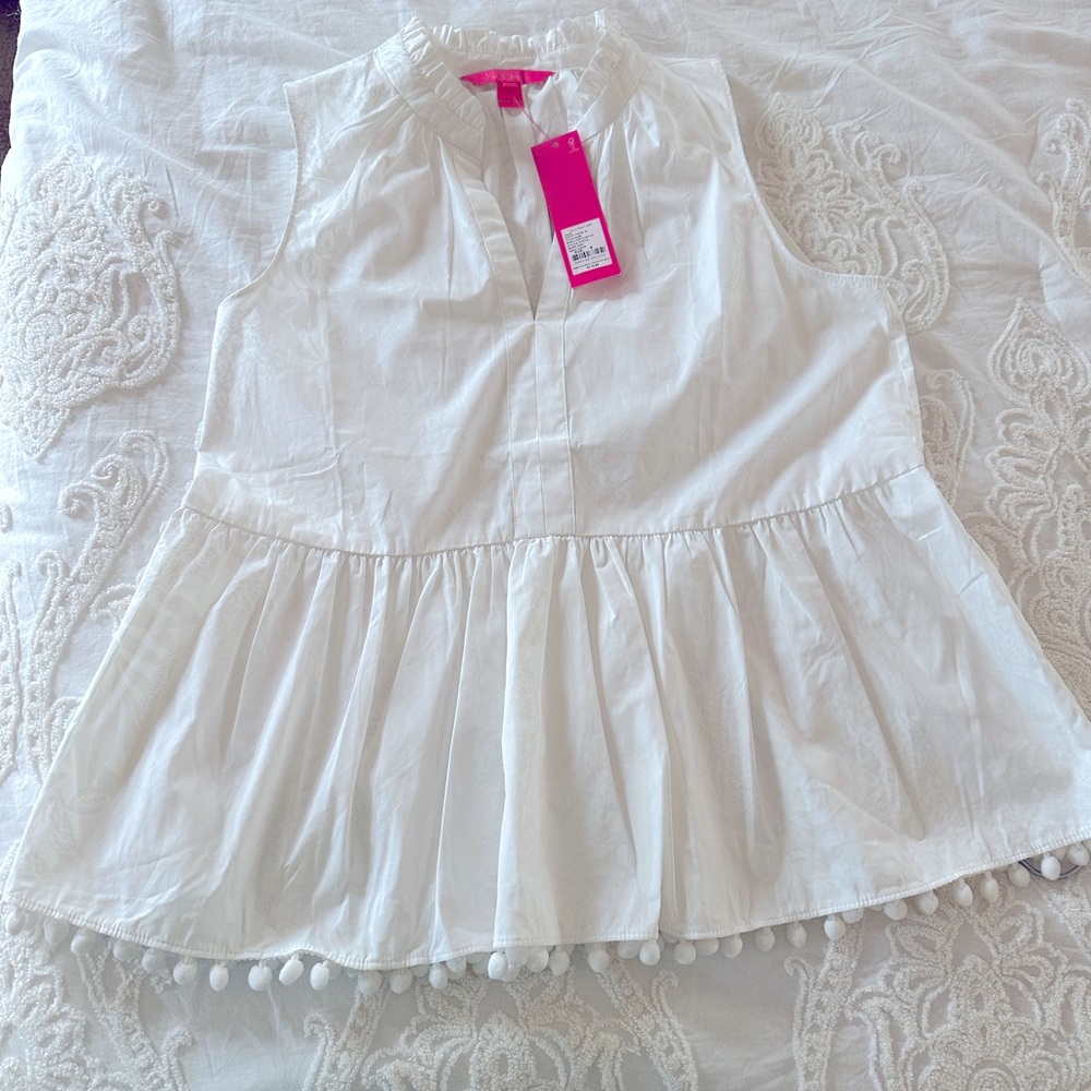 Women’s white Lilly Pulitzer top with pompoms on the bottom